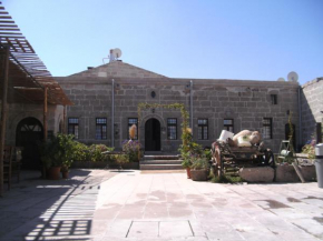 Отель Osmanoglu Hotel  Güzelyurt